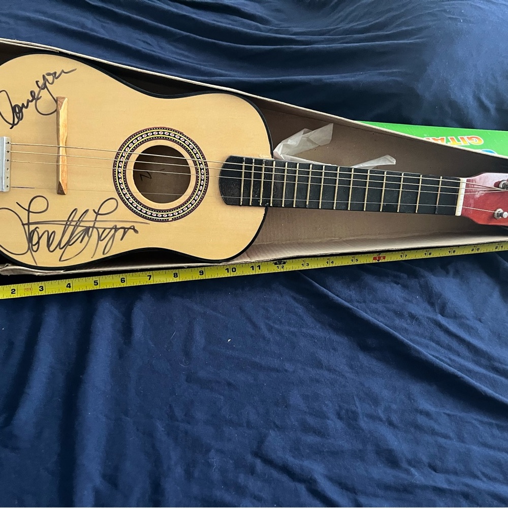 Signed Acoustic Guitar with Black Strings